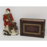 Victorian polychrome painted cast iron doorstop in the form of a seated man with mug of ale, 24.