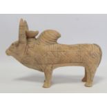 Antique Eastern terracotta votive figure of a zebu (humped) bull with painted monochrome geometric