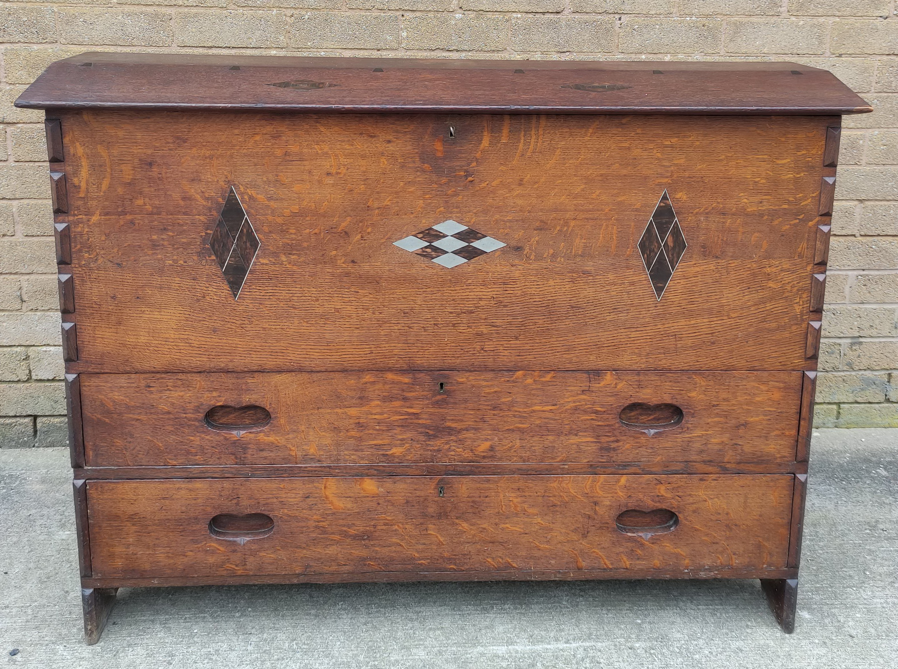 Rare Arts and Crafts coffer chest, attributed to  Heals, with tapering sides, angled rising top,