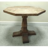 Robert "Mouseman" Thompson low oak occasional table, the octagonal top on faceted turned column