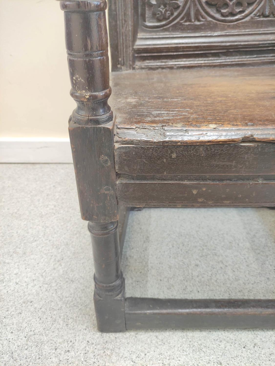 17th century wainscot chair, the foliate carved panel back with acorn finials, above solid seat, - Image 4 of 6