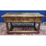 Robert "Mouseman" Thompson, oak serving table, the rectangular top above three drawers on faceted