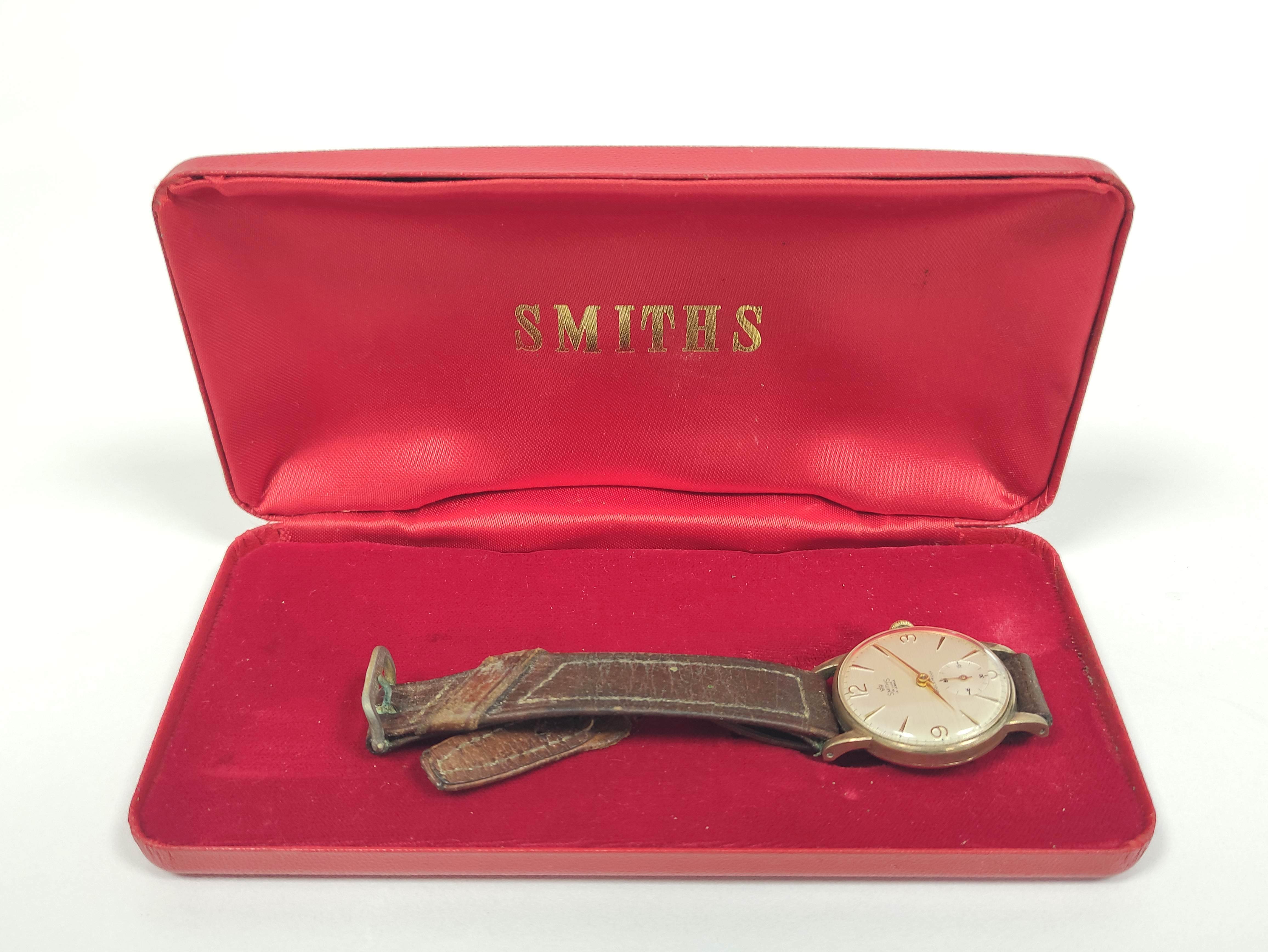 Smiths de Luxe 9ct gold watch inscribed and dated 'British Railways W L Wright' on strap 1962. 31mm.