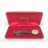 Smiths de Luxe 9ct gold watch inscribed and dated 'British Railways W L Wright' on strap 1962. 31mm.
