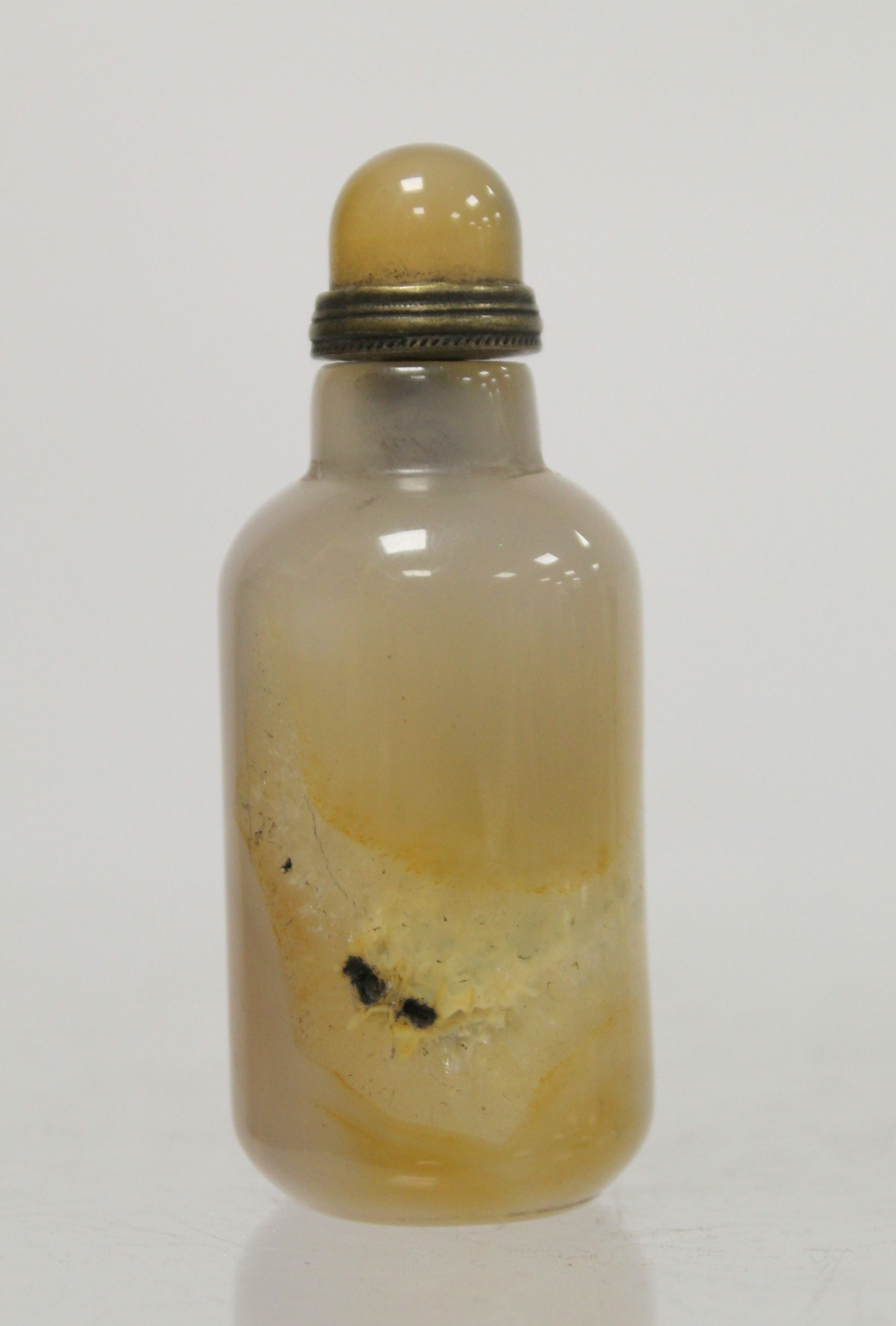 Chinese mottled brown and grey agate snuff bottle of cylindrical form with domed stopper. 8cm high.