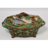 Victorian Minton majolica game pie tureen of twin handled oval form, the relief moulded naturalistic