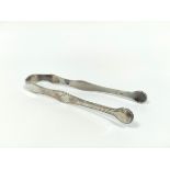 Silver bright cut sugar tongs, initialled by Hester Bateman circa 1790.