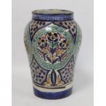 Islamic Iznik style tin glazed earthenware vase of baluster form, probably Moroccan, with four