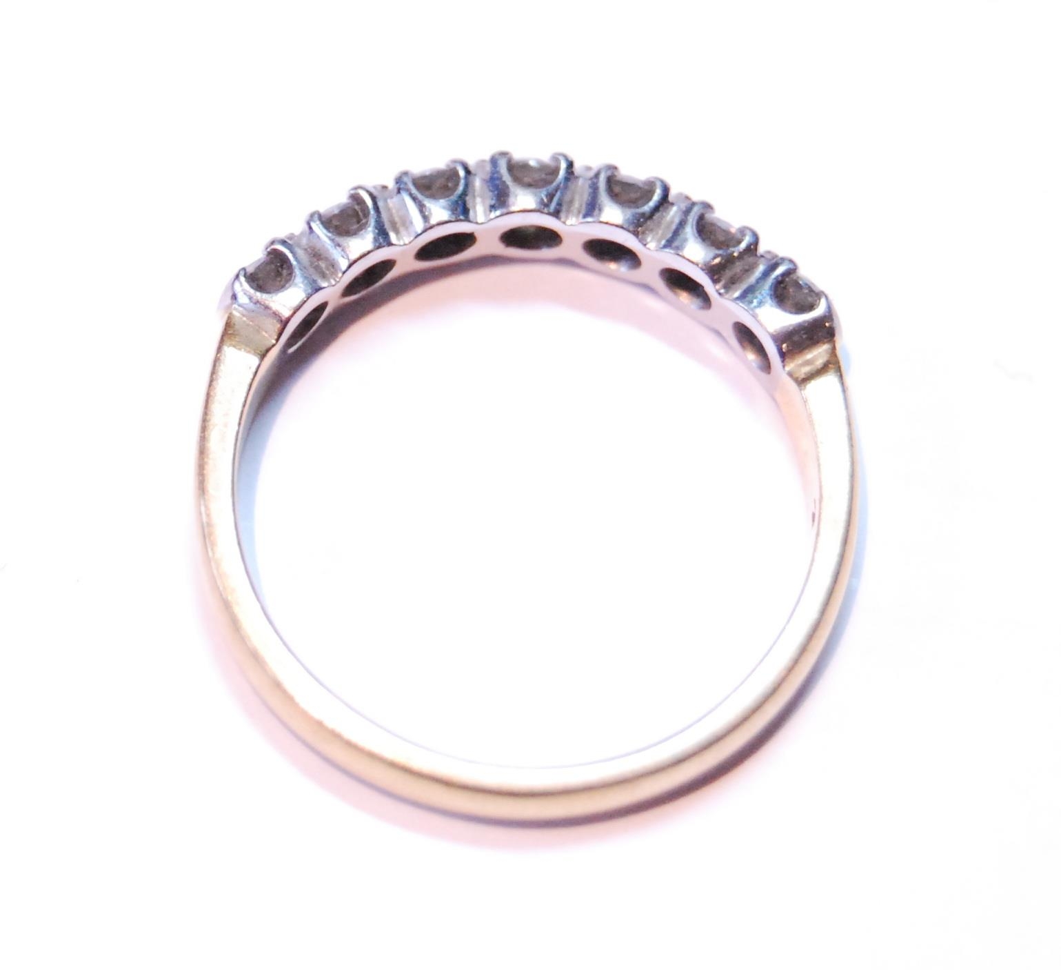 Diamond seven-stone half eternity ring with brilliants, approximately .05ct, in 18ct gold, size L, - Image 2 of 5