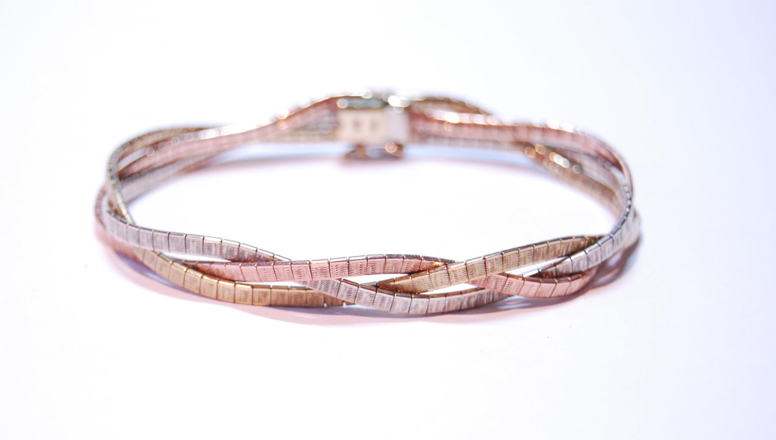 9ct coloured gold plaited bracelet, 17g.