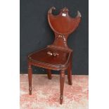 19th century mahogany hall chair by Gillows of Lancaster, with eagle surmounts to the the shield-