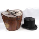 Black silk top hat retailed by Tress & Co., London, internal diameter 15.5cm x 19.5cm, with original