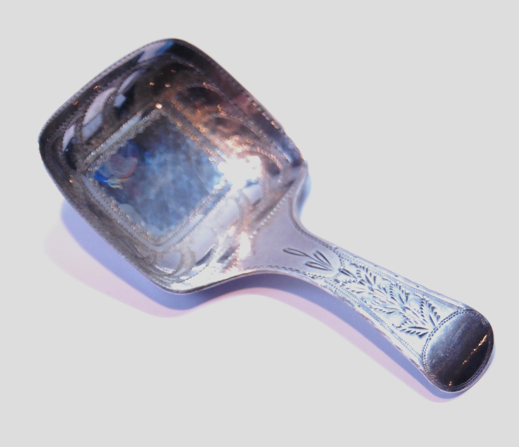 Silver caddy spoon with engraved rectangular bowl, by Joseph Willmore, Birmingham c. 1815.