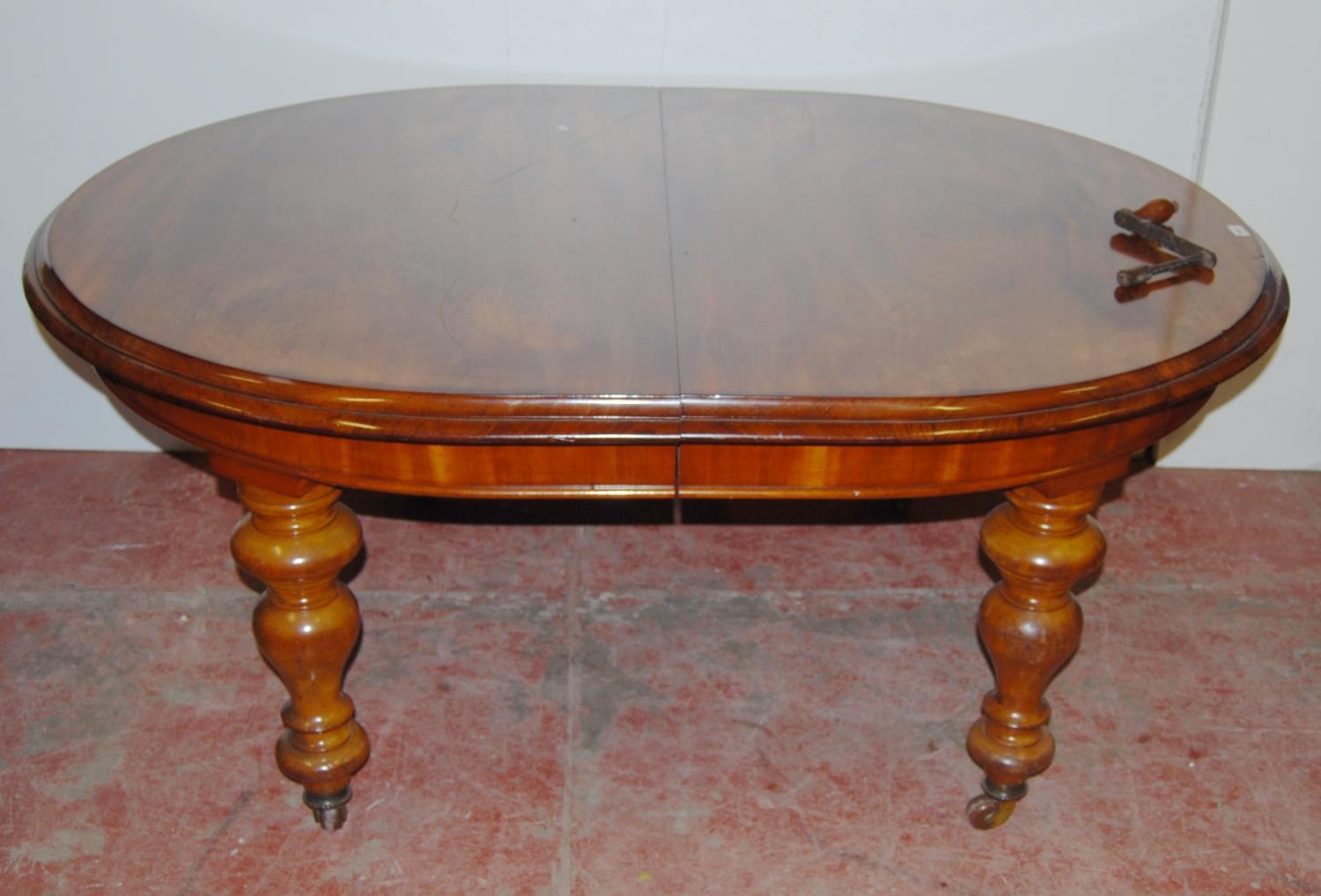 Victorian mahogany extending D-end dining table, on turned supports with castors, 71cm high, 167cm - Image 2 of 4