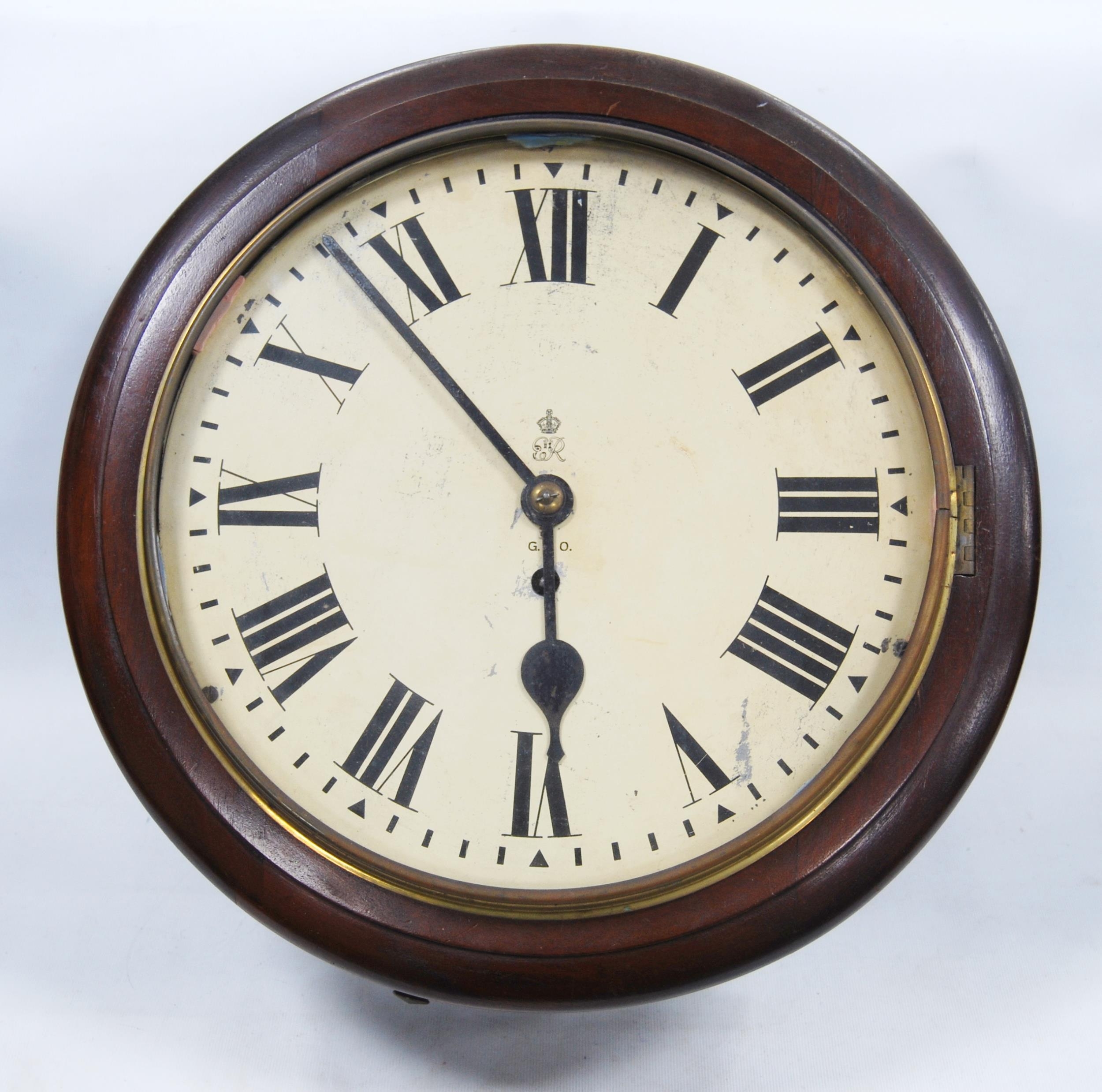 Early 20th century mahogany Post Office wall clock with fusee movement, 40cm diameter.