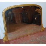 Antique gilt wood overmantel mirror decorated with acanthus and scroll brackets, mirror