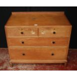 1920s oak chest of drawers in the manner of Heal's of London, with two short drawers, each with a