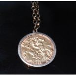 George V gold half sovereign pendant, 1911, mounted on a 9ct gold chain, 6.6g gross.