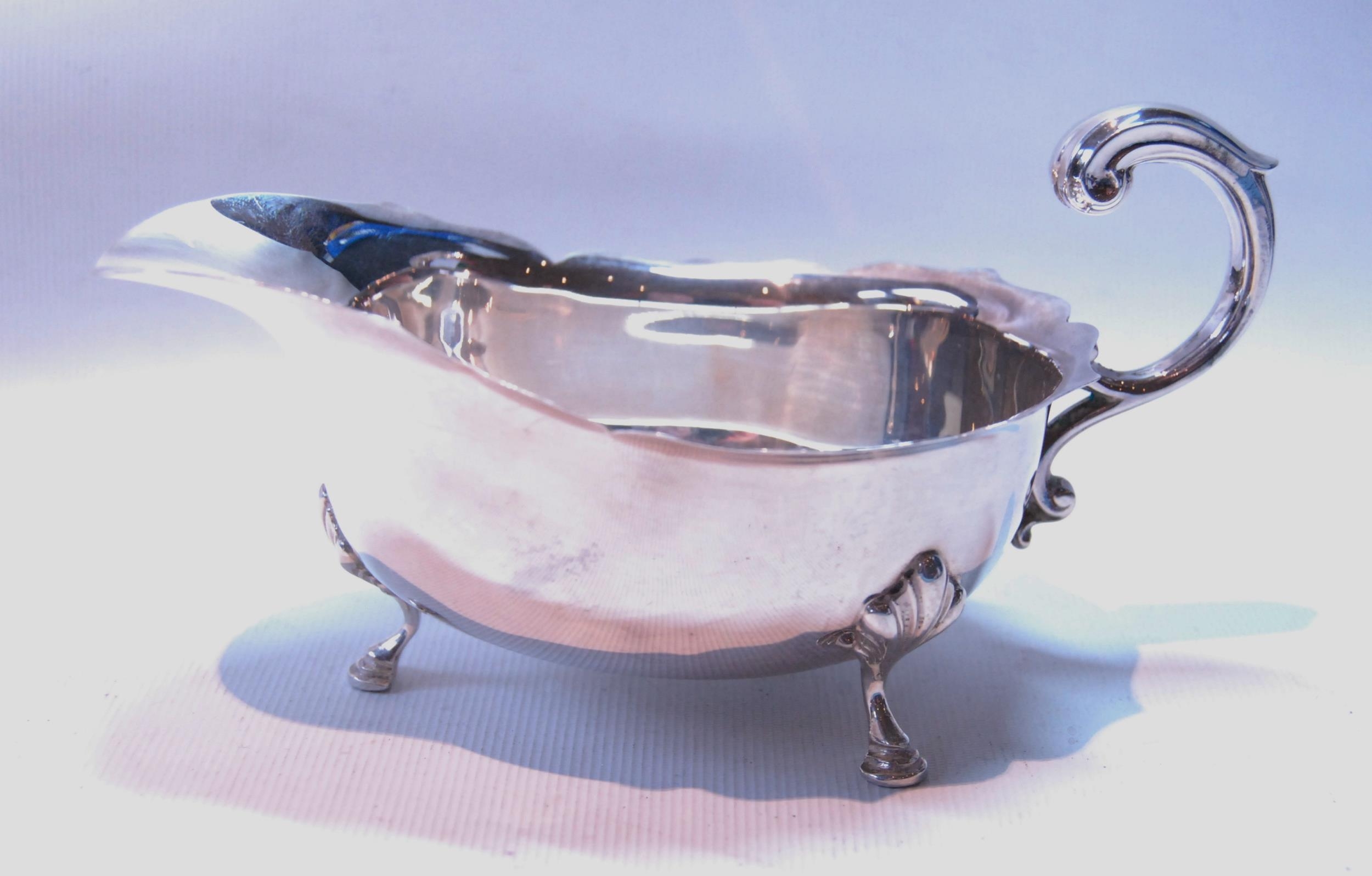 Silver sauce boat with cut edge on pad feet, and another, panelled oval, both by Adie Brothers, - Image 4 of 5