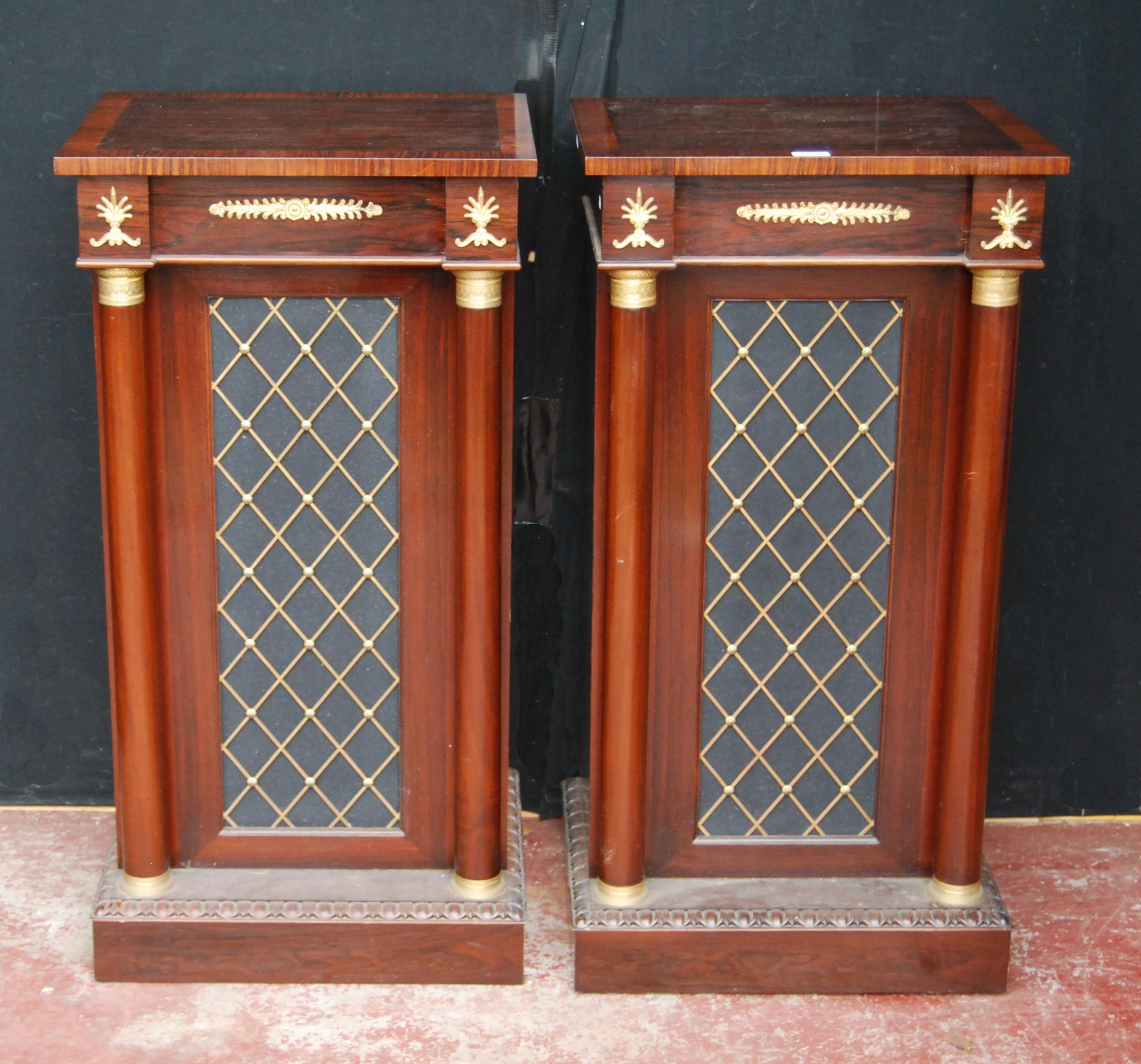 Pair of Regency-style rosewood veneered cabinets, each with a faux door flanked by cylindrical