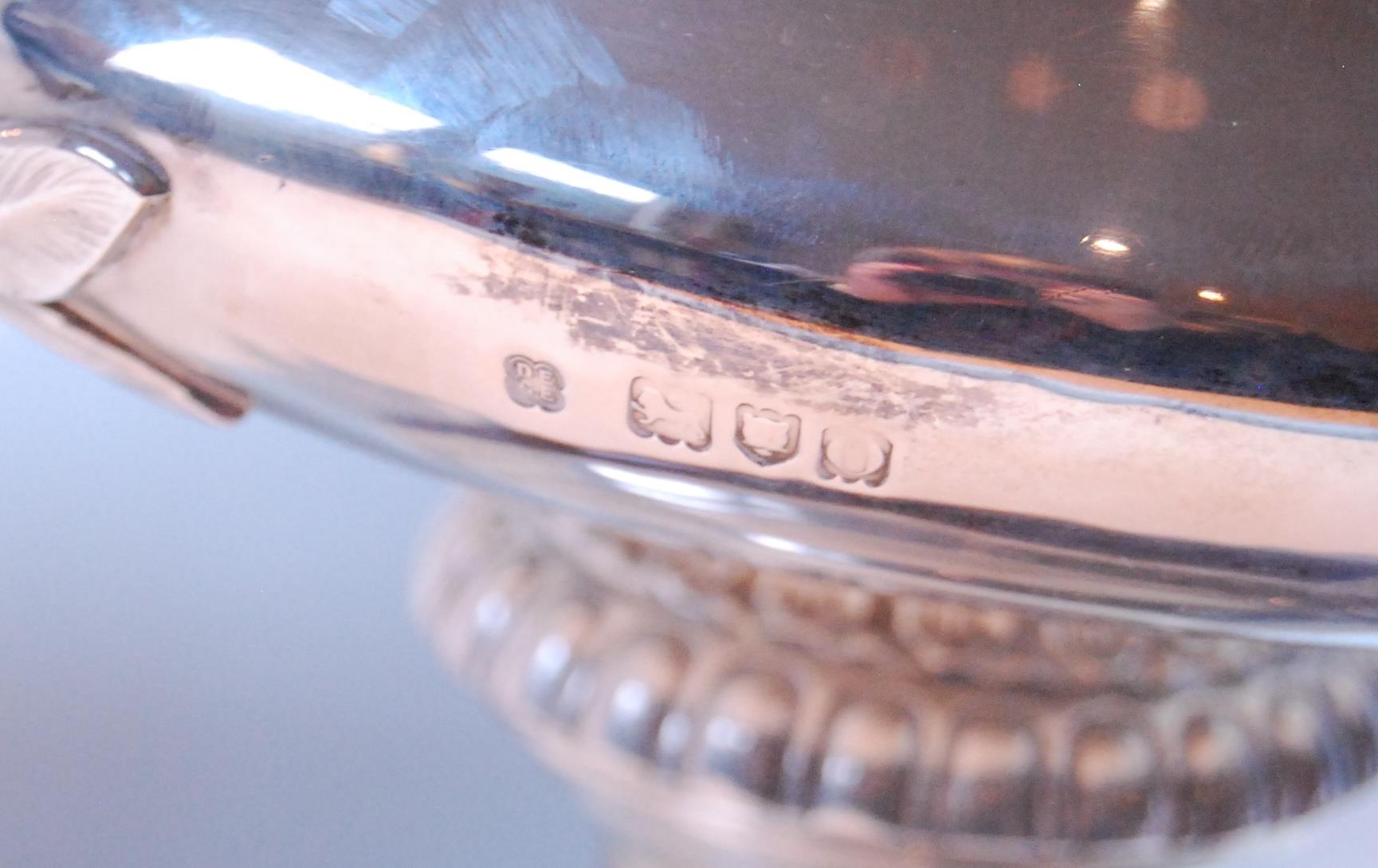 Silver circular bowl with gadrooned and foliate border and leafage bifurcated handles, on moulded - Image 2 of 3