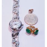 9ct gold medal, 6.8g, a pair of earrings and a fashion watch.