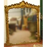 19th century French giltwood and gesso overmantel mirror with pierced roundels to the top above