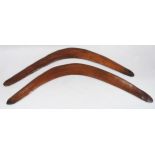 Near-pair of Aboriginal boomerangs, c. early to mid 20th century, 49cm long, 5.5cm and 6cm deep.  (