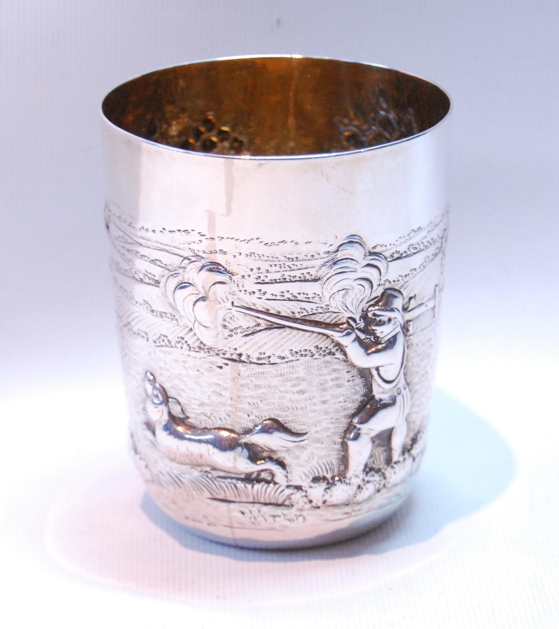 Silver beaker embossed with a huntsman in landscape, maker's mark not clear, Sheffield 1814, 9.