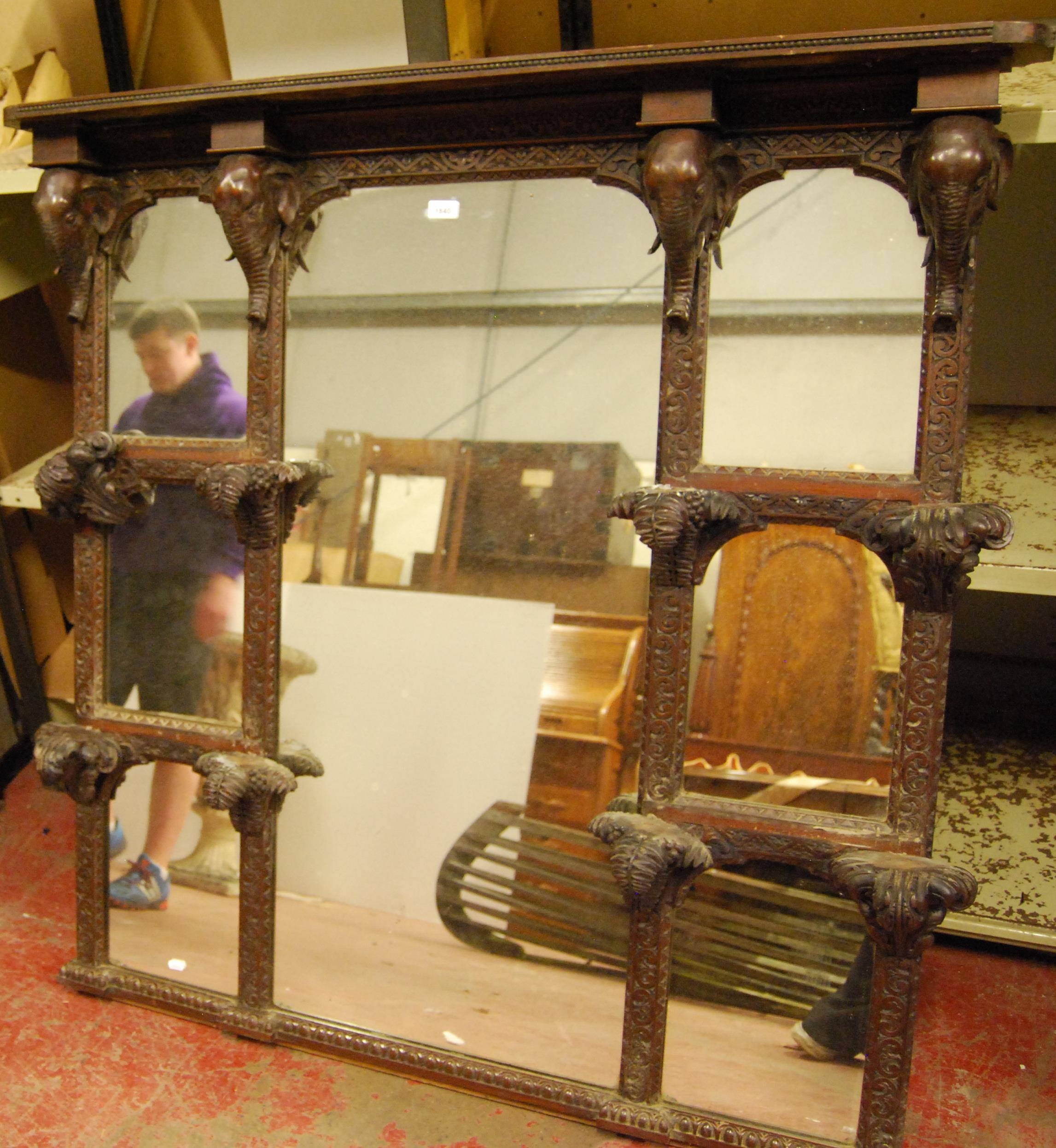 Antique Anglo-Indian padouk and hardwood overmantel mirror with four elephant head brackets above