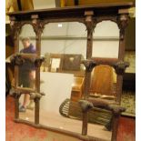 Antique Anglo-Indian padouk and hardwood overmantel mirror with four elephant head brackets above