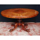 Victorian burr walnut loo-type table, the oval top with snap action mechanism, on turned column