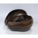 Coco de Mer nut carved in the form of a basket, origin Seychelles, 11cm high and approximately