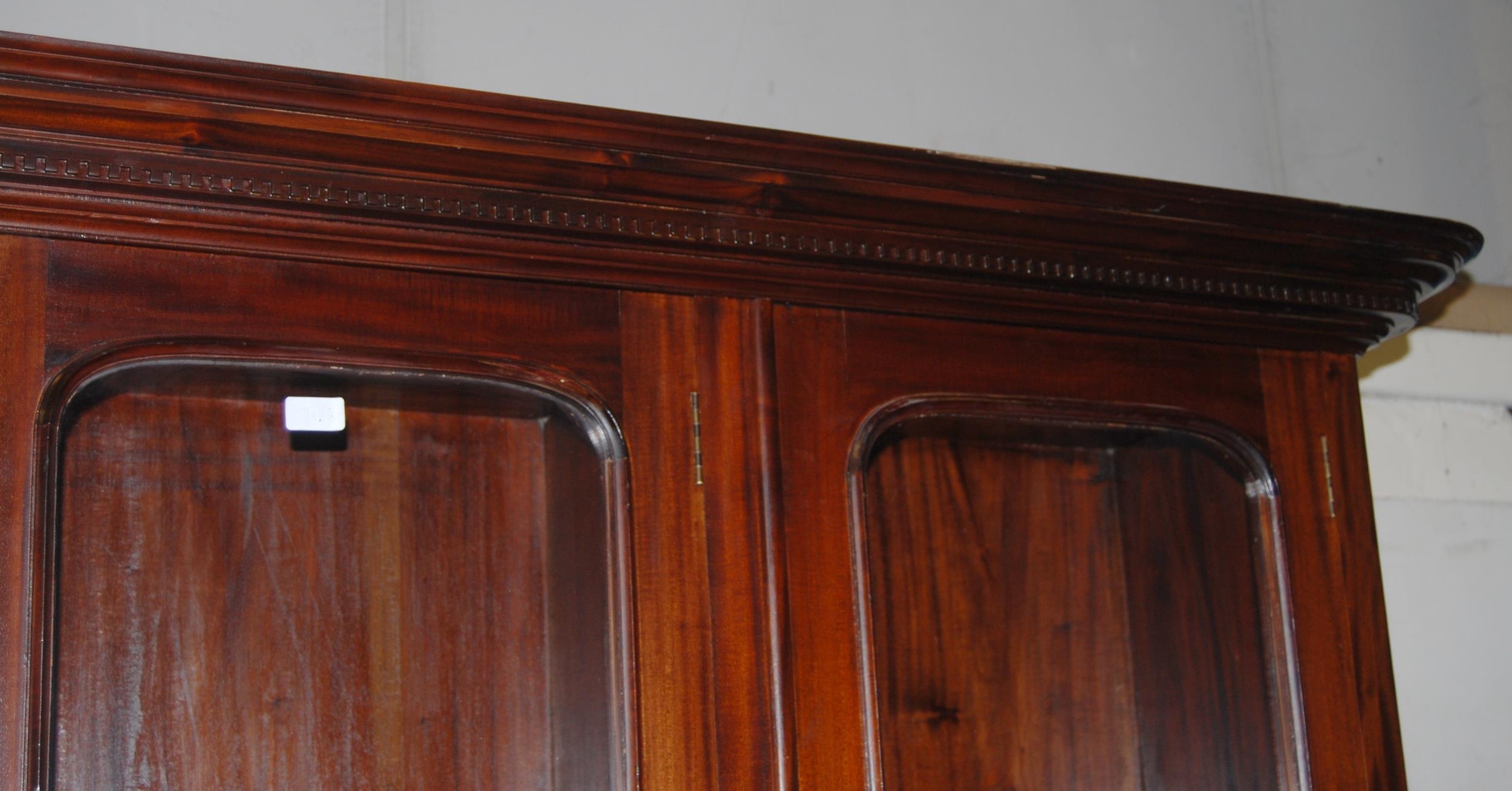 Victorian-style mahogany four-door library bookcase, the dentil decorated cornice above four - Image 3 of 7