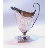 Silver helmet cream jug with engraved swags and bands upon a square foot (now loaded), maker's