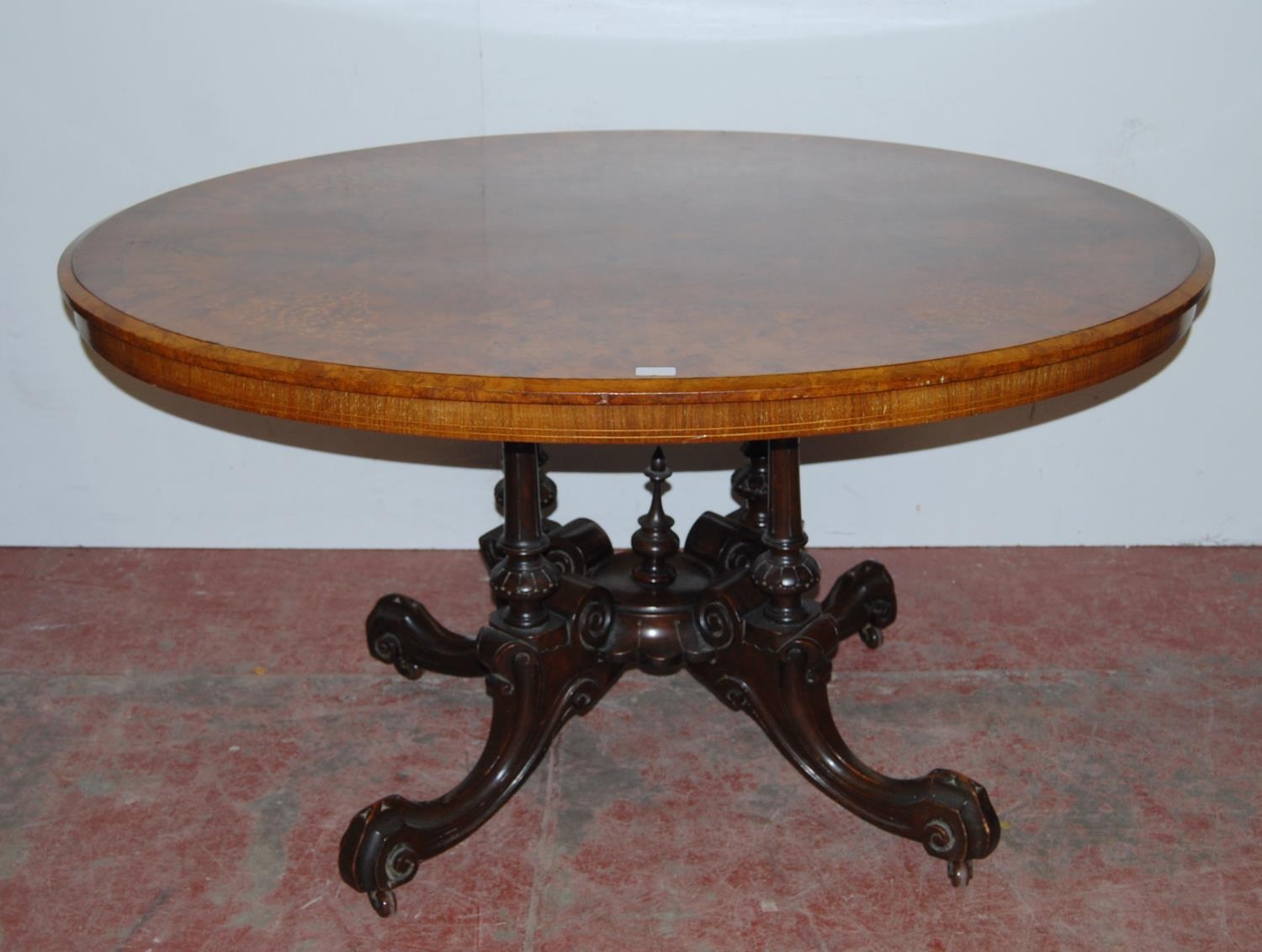 Victorian figured walnut loo type table by James Shoolbred, Tottenham Court Road, London, the inlaid