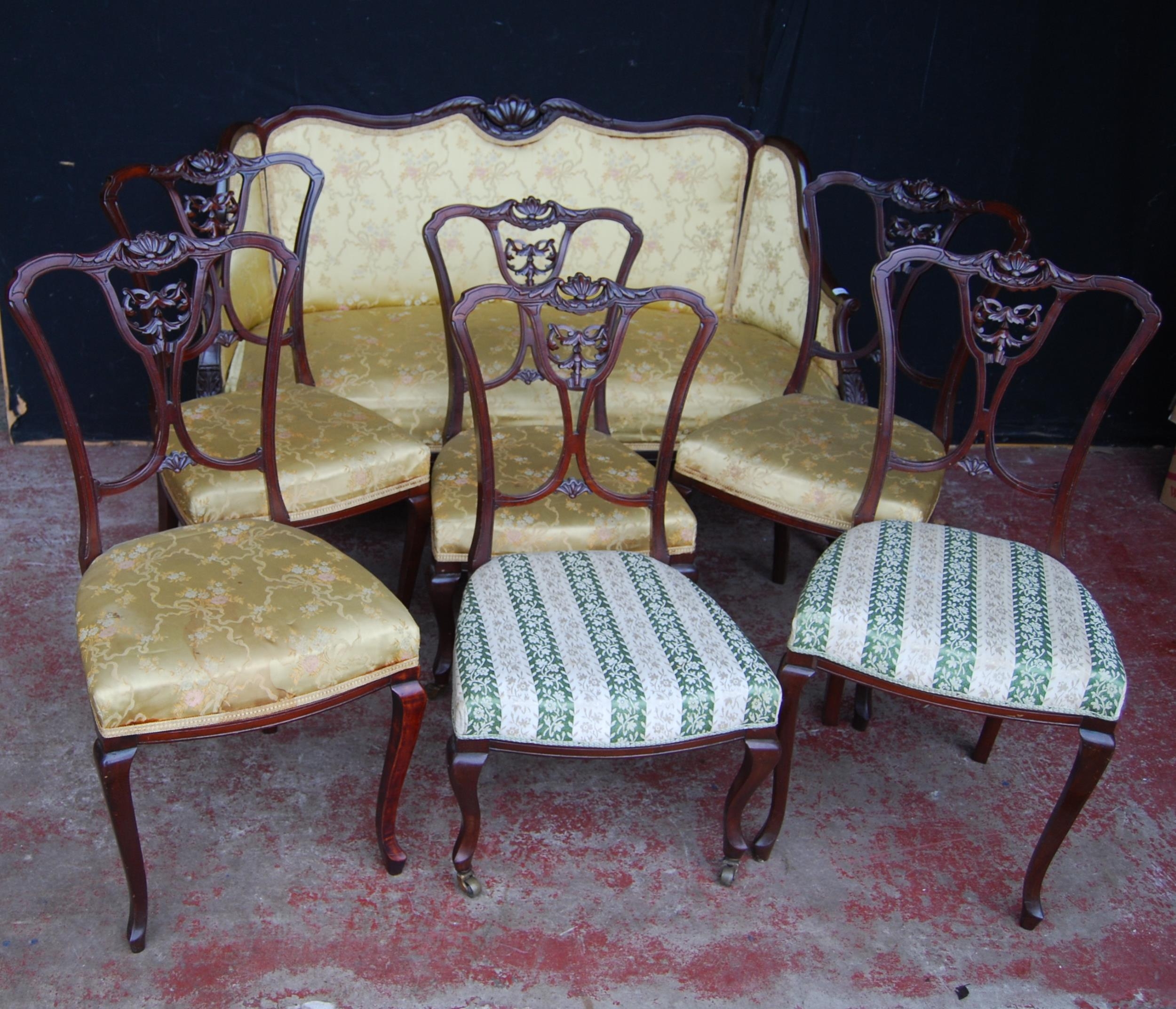 Edwardian composite mahogany seven-piece parlour suite comprising a settee and six matching side and