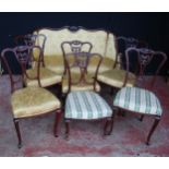 Edwardian composite mahogany seven-piece parlour suite comprising a settee and six matching side and