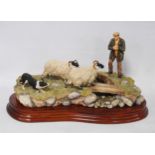 Border Fine Arts limited edition group by Ray Ayres modelled as a farrier with sheepdog and sheep,