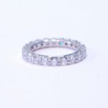 Diamond eternity ring with twenty-two brilliants, each approximately .10ct, in platinum, size L.