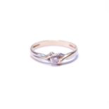 Diamond solitaire ring with collet-set brilliant, in 18ct gold, size P.