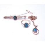 Opal doublet bar brooch, a similar ring, '18ct', and a pendant.