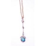 Edwardian gold pendant with blue zircon suspended from tiny diamonds in gold, 4.9g.