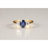 Ladies 18 carat gold diamond and sapphire ring, sapphire with 0.2 carat diamonds on either side.