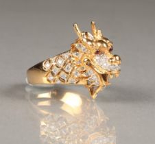 Gents diamond set 18 carat gold ring, in the form of a Chinese dragon with ruby eyes, ring size U/V,