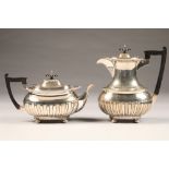 Edwardian Walker and Hall silver four piece coffee and tea service, half fluted form, raised on