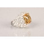 Platinum diamond and citrine ring, set with 42 marquise cut diamonds, total approximately 12 carats,