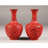Pair 19th Century Chinese carved cinnabar lacquer vases, baluster form, decorated with Chinese
