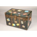 Travel trunk with various luggage labels, width 58cm, height 57cm