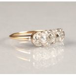 Ladies 14 carat diamond cluster ring five old cut graduated diamonds, surrounded by smaller diamonds